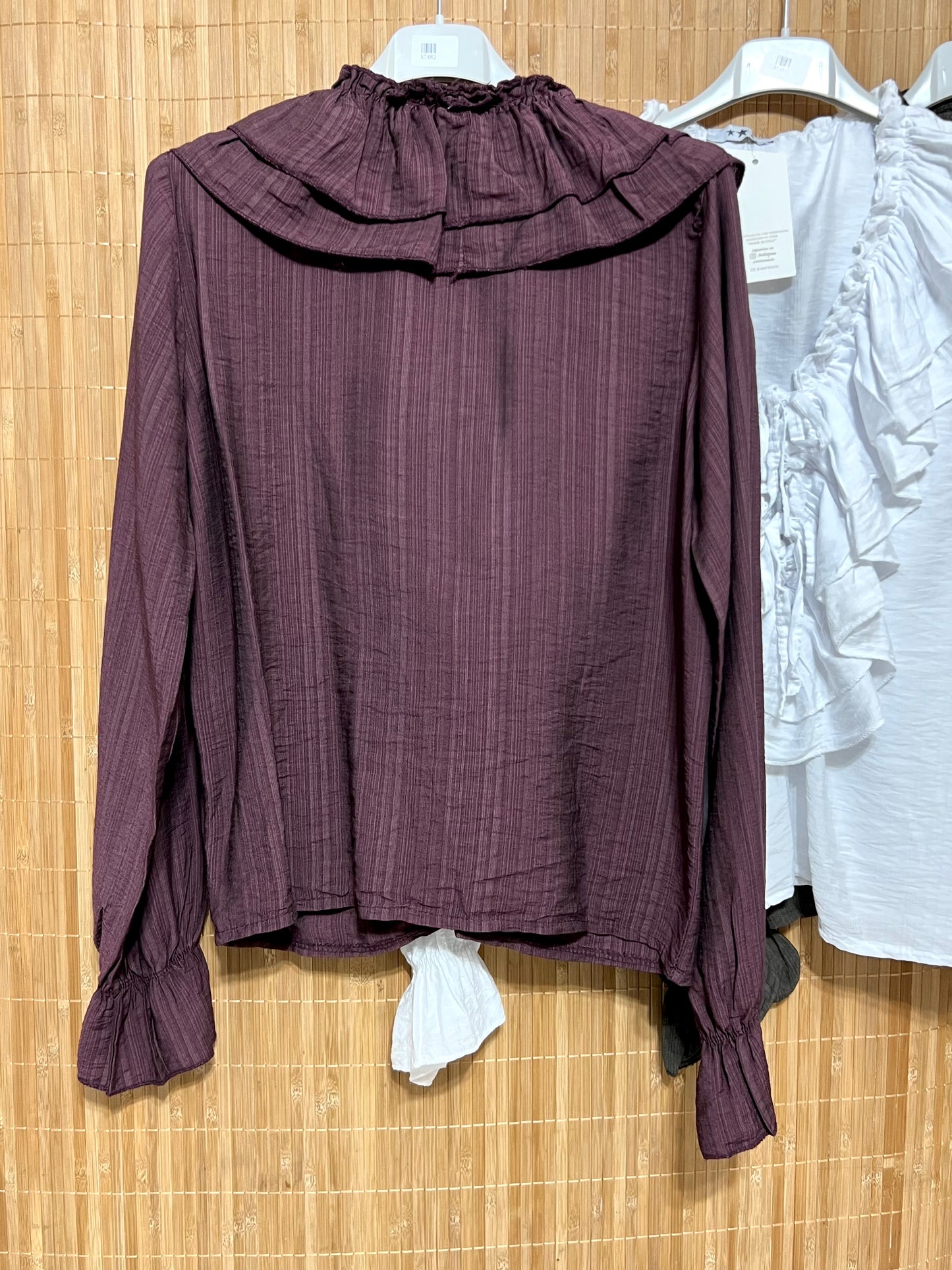 Blusa lisa con volantes y lazo | Puño elástico | Colores burdeos, blanco y negro